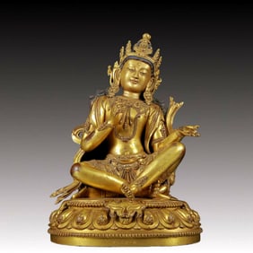 A solemn gilt bronze statue of Bodhisattva