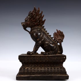 A Solemn Gilt Bronze Lion Ornament