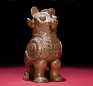 An Exquisite Gaogu Jade Beast-Face Pattern Bird Ornament