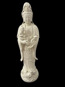 A Solemn Blance-De-Chine Statue of Avalokitesvara