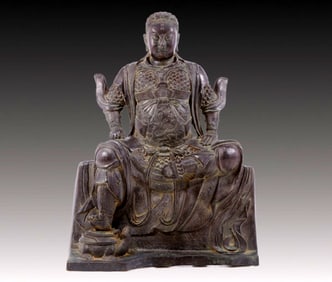 solemn bronze statue of Emperor Zhenwu
