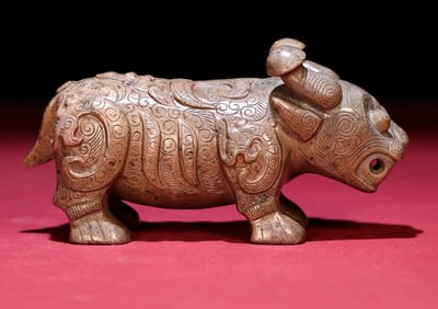 An Exquisite Gaogu Jade Beast-Face Pattern Buffalo Hand Piece