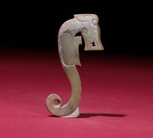 An Exquisite White Jade Dragon Pendant