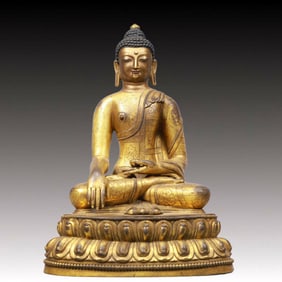 A Solemn Gilt Bronze Statue of Sakyamuni