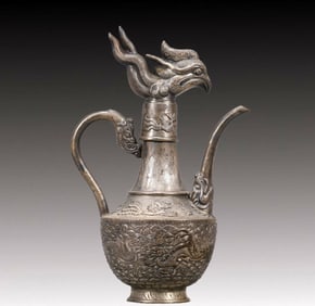 A Precious Silver 'Auspicious Beast& Ocean' Ewer