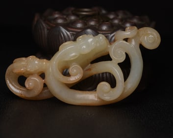 A Rare Hetian Jade Dragon-Shaped Pendant