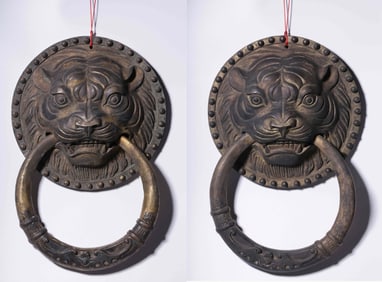 A Rare A pair of Bronze Door Knocker