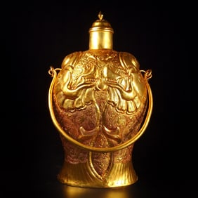 A Rare Gilt Bronze Carved Handle Ewer