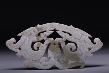 A Rare Archaic Jade Double Dragon Pendant