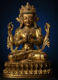 A Rare Gilt Bronze Inlaid Gem Four-Arm Avalokitesvara Seated Statue