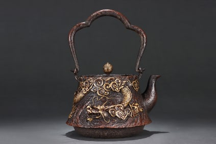 A Rare Gilded Copper Cloud and Dragon Pattern Ewer