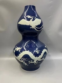 A Rare Ji Blue Glazed Carved Dragon and Phoenix Pattern Gourd-Shaped Vase