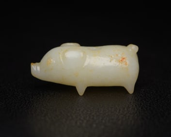 A Rare Hetian Jade Pig-Shaped Pendant