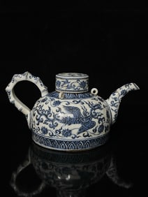 A Rare Blue and White Lotus and Phoenix Pattern Ewer