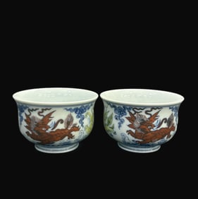 A pair of Rare Doucai Auspicious Beast Pattern Cup
