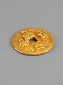 A Rare Gilt Silver Coin