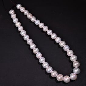 A Rare Natural Round Pearl Necklace