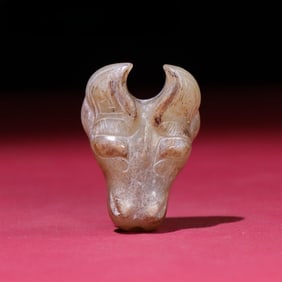 A Rare Archaic jade Buffalo Pendant