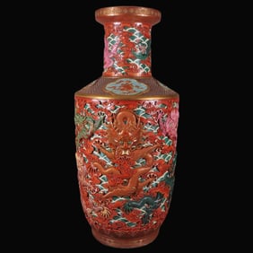 A Rare Famille-Rose Carved Seawater and Dragon Patterns  Outline in Gold Vase