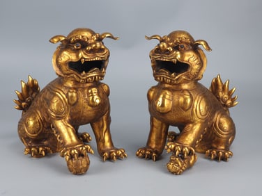 A pair of Rare Gilt Bronze Lions