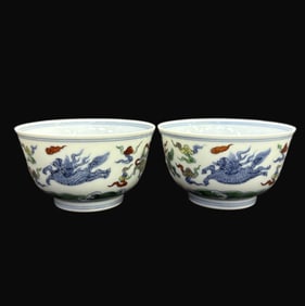 A pair of Rare Doucai Auspicious Beast Pattern Cup