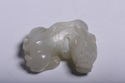 A Rare Hetian Jade Auspicious Beast Handle Ornament