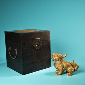 A Rare Coppery High Relief Carved Gilded Kylin