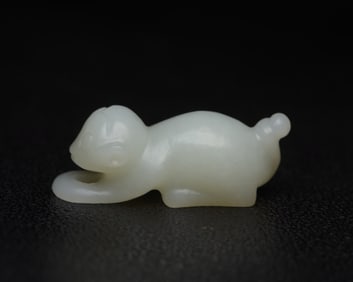 A Rare Hetian Jade Monkey-Shaped Pendant