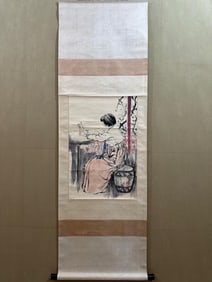 A Chinese Painting of Figures on Paper With a Hanging Scroll