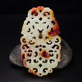 An Exquisite White Jade Dragon Pendant