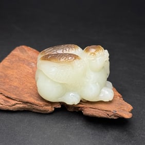 An Exquisite White Jade Auspicious Beast Ornament