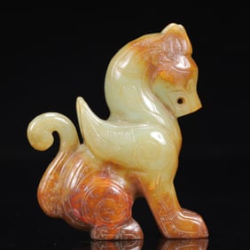 An Exquisite White Jade Auspicious Beast Ornament