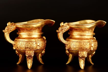 A Pair of Rare Gilt Bronze Beast Pattern Tripod Cups
