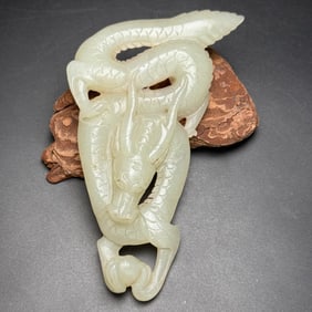 An Exquisite White Jade Dragon Ornament