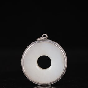 An Exquisite Silver Inlaid White Jade Pendant