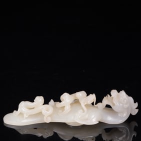 An Exquisite White Jade Dragon Pattern Ruyi Ornament
