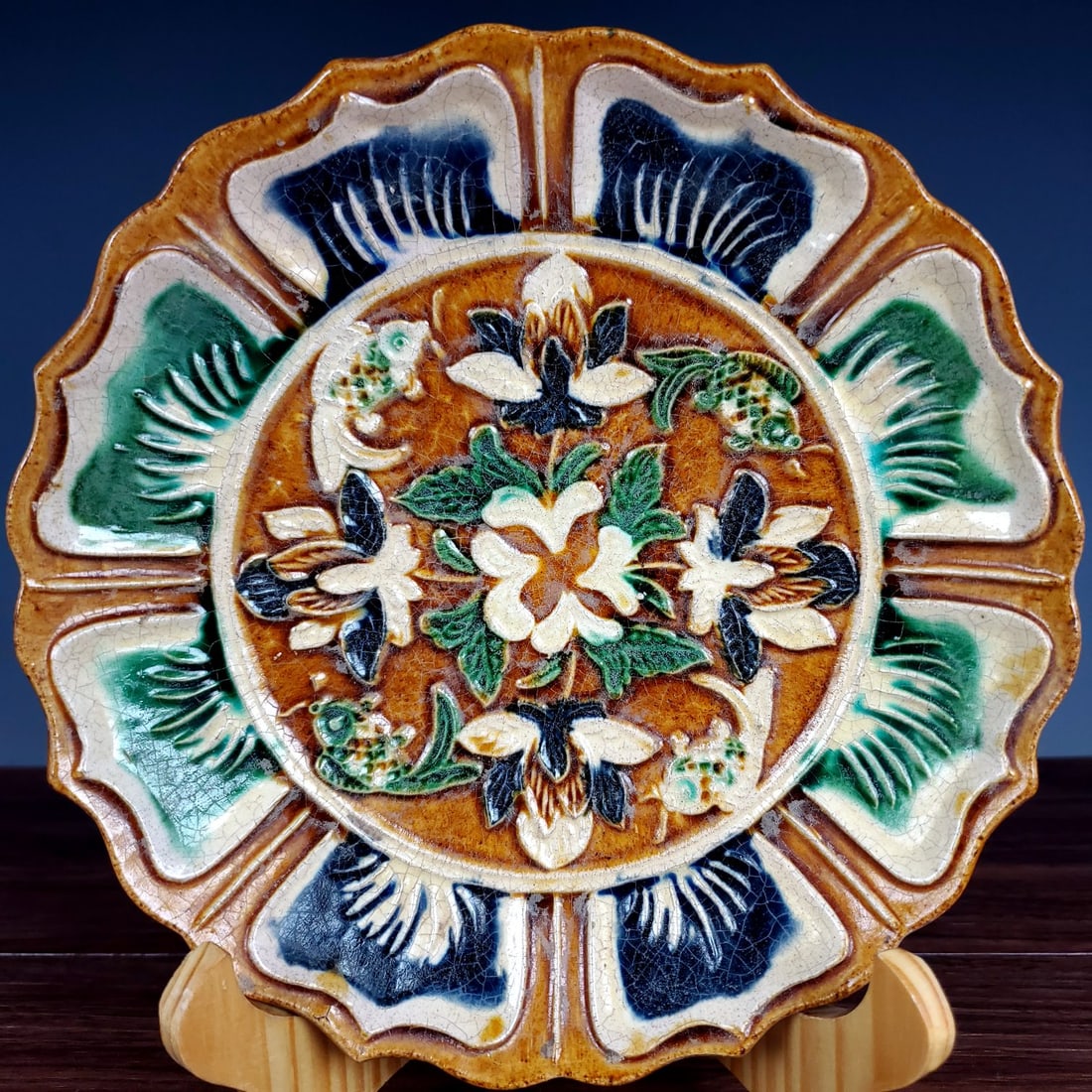 A Rare Tang Tri-Color Glazed Pottery Flower and Fish Pattern Plate: A Rare Tang Tri-Color Glazed Pottery Flower and Fish Pattern Plate,Tang Dynasty,China,Size:1.6inx7.2in 唐三彩花卉鱼纹盘,中国唐代