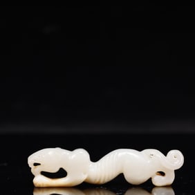 An Archaic Hongshan Culture White Jade Tiger Pendant