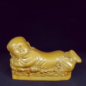 A Rare Tang Tri-Color Glazed Pottery Yellow Glazed Figure Pillow