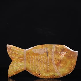 An Archaic Liangzhu Culture Yellow Jade Fish Ornament