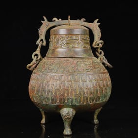 An Archaic Bronze Beast Pattern Double-Ears and Tripod Censer