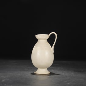 An Exquisite Ding yao White Glazed Flower Pattern Ewer