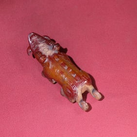 An Exquisite White Jade Animal Hand Piece