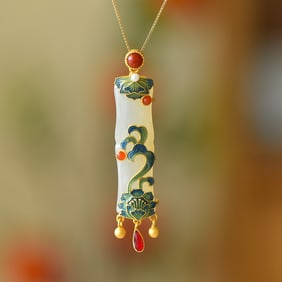 An Exquisite Sterling Silver-Gold Plated Inlaid White Jade Pendant
