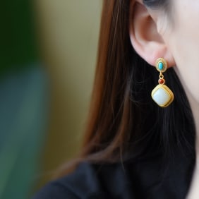 A Pair of Exquisite Sterling Silver-Gold Plated Inlaid White Jade Earrings