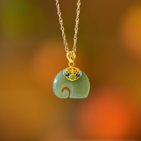 An Exquisite Sterling Silver-Gold Plated Inlaid Sapphire Pendant