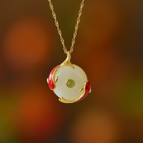 An Exquisite Sterling Silver-Gold Plated Inlaid White Jade Pendant