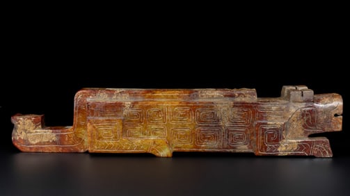 An Archaic Gaogu yu Tiger Ornament