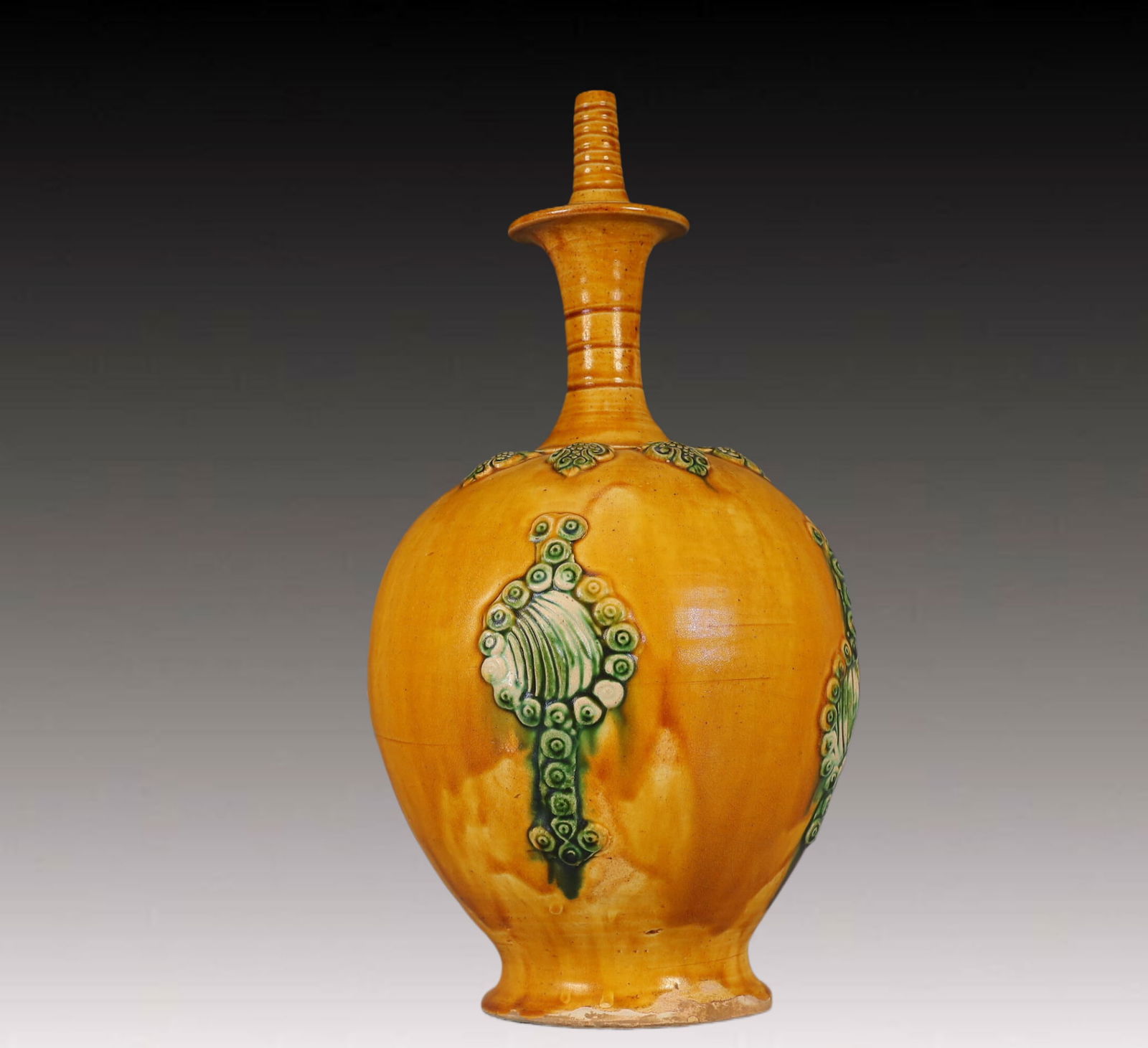 A Rare Tang Tri-Color Glazed Pottery Flower Pattern Vase: A Rare Tang Tri-Color Glazed Pottery Flower Pattern Vase,Tang Dynasty, China,Size:7.1inx7.1inx13.4in,Weight:1700g 唐三彩花卉纹瓶，中国ࢁ