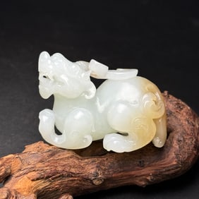 An Exquisite White Jade Auspicious Beast Ornament